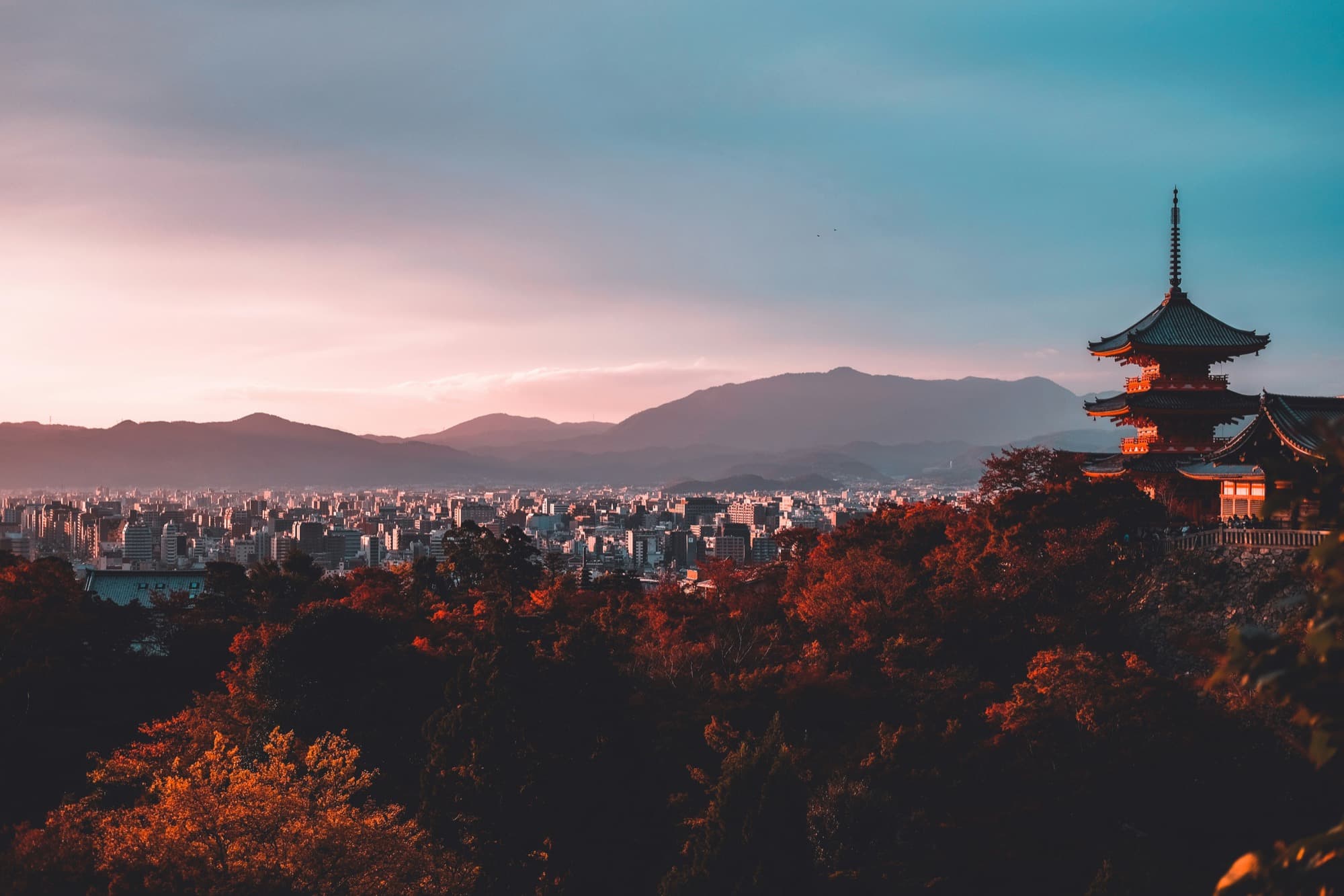 Kyoto pagoda at sunset with fall foliage